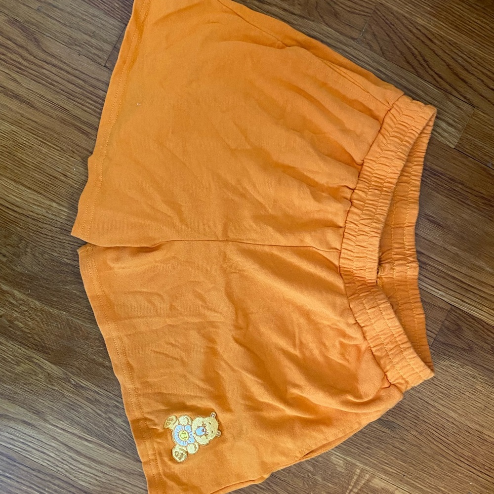 Care Bears loose orange shorts